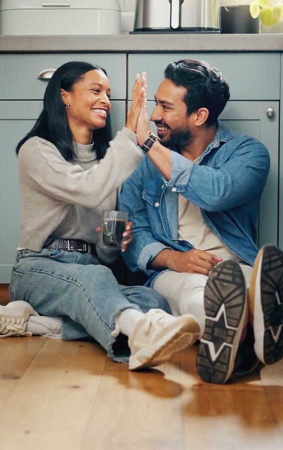 Couple happy high five at chicken