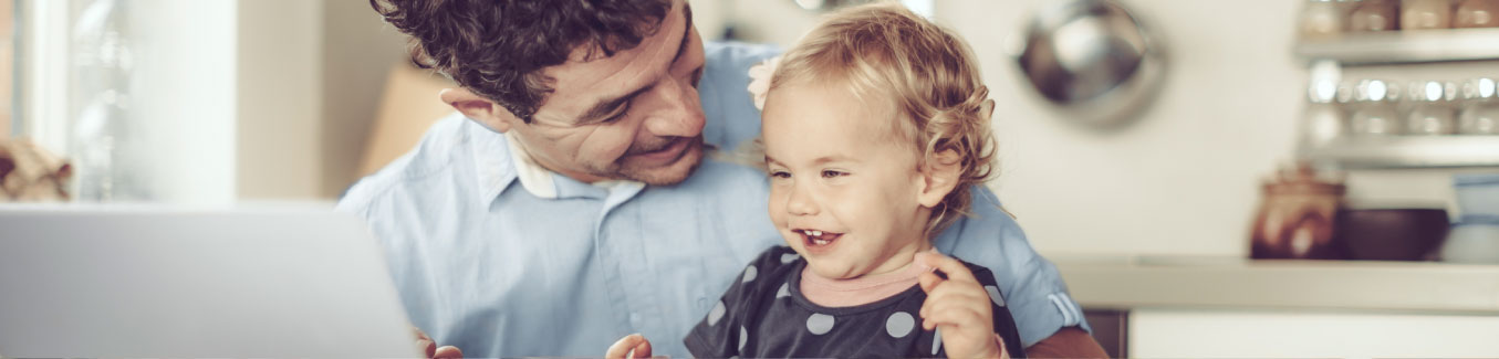 Dad with Baby Smiling