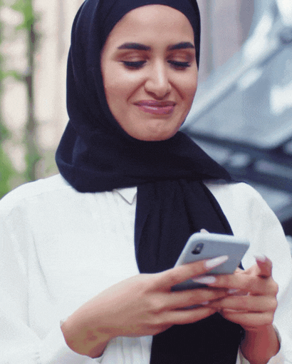woman looking at phone